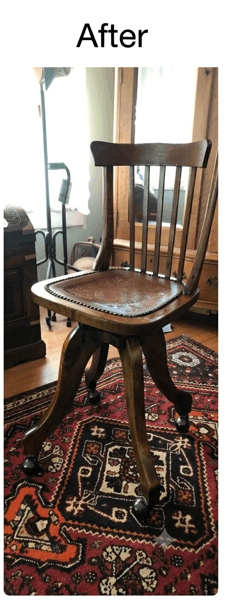 Restored antique parlor chair with preserved stamped leather seat, renewed stain, and clear varnish.