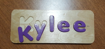 name puzzle wooden