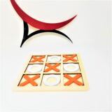 Brain teaser game of tic tac toe made from natural wood