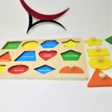 Wooden puzzle with colorful shapes for interactive learning