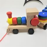 Interactive Geometric Shapes Sorting Train: Enhancing cognitive skills through hands-on play.